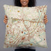Person holding 22x22 Custom Alpharetta Georgia Map Throw Pillow in Woodblock