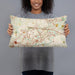 Person holding 20x12 Custom Alpharetta Georgia Map Throw Pillow in Woodblock