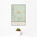12x18 Alpine Texas Map Print Portrait Orientation in Woodblock Style With Small Cactus Plant in White Planter