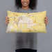 Person holding 20x12 Custom Altoona Iowa Map Throw Pillow in Woodblock