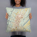 Person holding 18x18 Custom Altoona Pennsylvania Map Throw Pillow in Woodblock