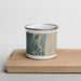 Front View Custom Amelia Island Florida Map Enamel Mug in Afternoon on Cutting Board