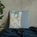 Custom Amelia Island Florida Map Throw Pillow in Woodblock on Bedding Against Wall