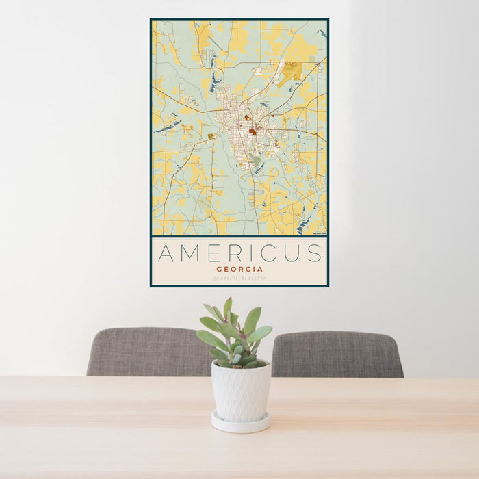 24x36 Americus Georgia Map Print Portrait Orientation in Woodblock Style Behind 2 Chairs Table and Potted Plant