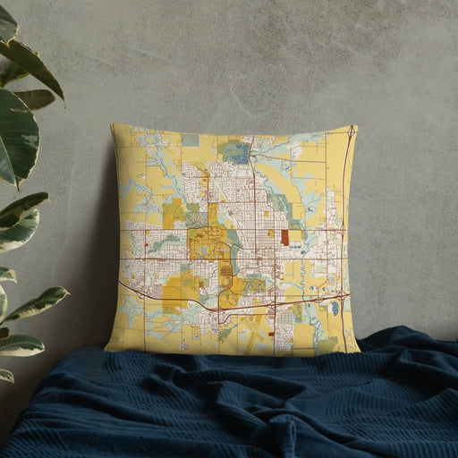 Custom Ames Iowa Map Throw Pillow in Woodblock on Bedding Against Wall