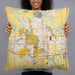 Person holding 22x22 Custom Ames Iowa Map Throw Pillow in Woodblock