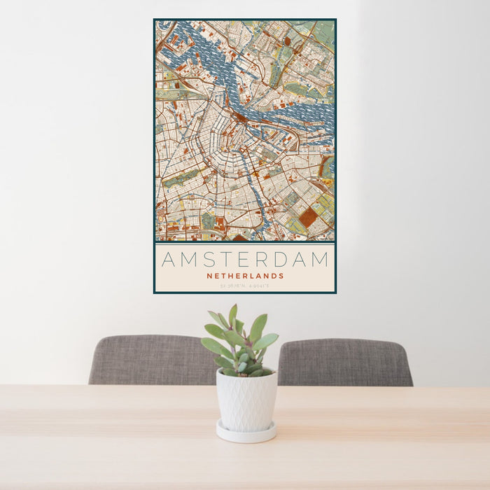24x36 Amsterdam Netherlands Map Print Portrait Orientation in Woodblock Style Behind 2 Chairs Table and Potted Plant