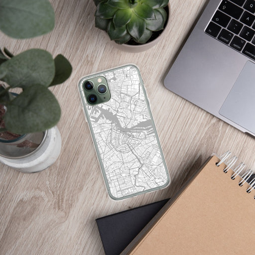 Custom Amsterdam Netherlands Map Phone Case in Classic on Table with Laptop and Plant