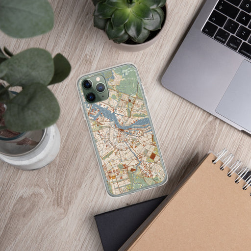 Custom Amsterdam Netherlands Map Phone Case in Woodblock on Table with Laptop and Plant
