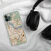 Custom Amsterdam Netherlands Map Phone Case in Woodblock on Table with Black Headphones