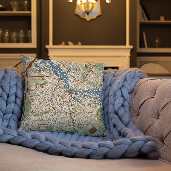 Custom Amsterdam Netherlands Map Throw Pillow in Woodblock on Cream Colored Couch