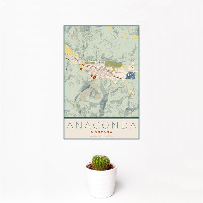 12x18 Anaconda Montana Map Print Portrait Orientation in Woodblock Style With Small Cactus Plant in White Planter