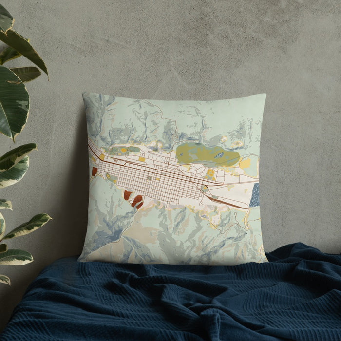 Custom Anaconda Montana Map Throw Pillow in Woodblock on Bedding Against Wall