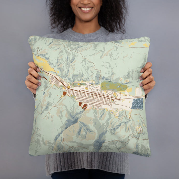 Person holding 18x18 Custom Anaconda Montana Map Throw Pillow in Woodblock