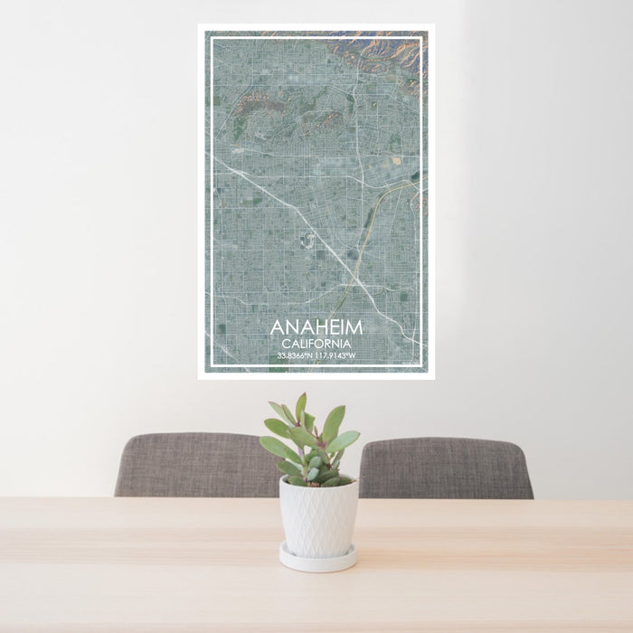 24x36 Anaheim California Map Print Portrait Orientation in Afternoon Style Behind 2 Chairs Table and Potted Plant