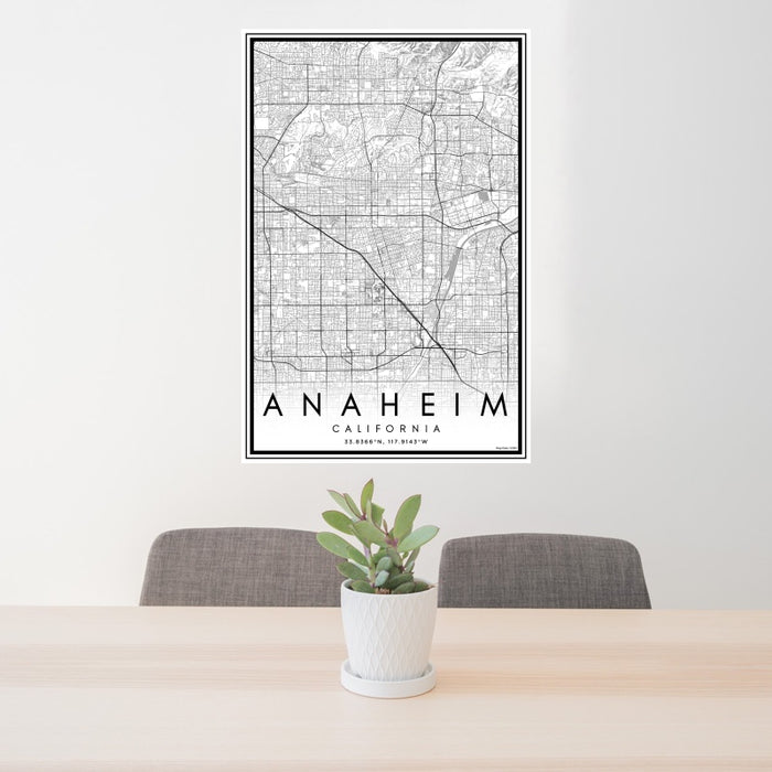 24x36 Anaheim California Map Print Portrait Orientation in Classic Style Behind 2 Chairs Table and Potted Plant
