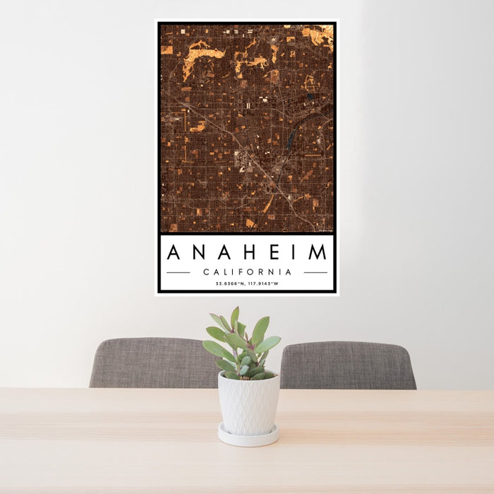24x36 Anaheim California Map Print Portrait Orientation in Ember Style Behind 2 Chairs Table and Potted Plant
