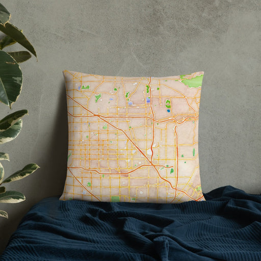 Custom Anaheim California Map Throw Pillow in Watercolor on Bedding Against Wall