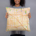 Person holding 18x18 Custom Anaheim California Map Throw Pillow in Watercolor