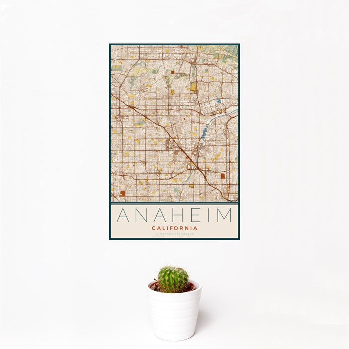 12x18 Anaheim California Map Print Portrait Orientation in Woodblock Style With Small Cactus Plant in White Planter