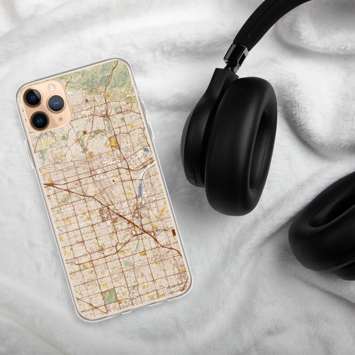 Custom Anaheim California Map Phone Case in Woodblock on Table with Black Headphones