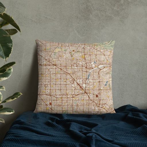 Custom Anaheim California Map Throw Pillow in Woodblock on Bedding Against Wall