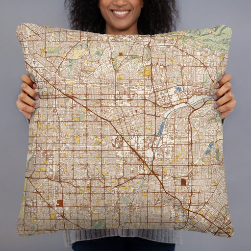 Person holding 22x22 Custom Anaheim California Map Throw Pillow in Woodblock
