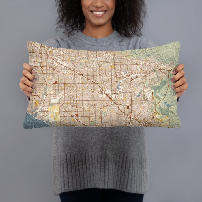 Person holding 20x12 Custom Anaheim California Map Throw Pillow in Woodblock