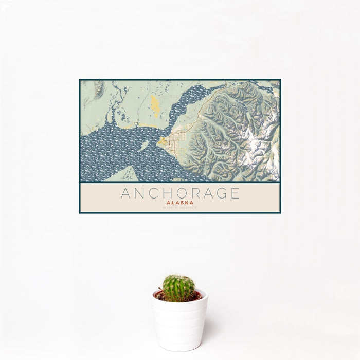 12x18 Anchorage Alaska Map Print Landscape Orientation in Woodblock Style With Small Cactus Plant in White Planter