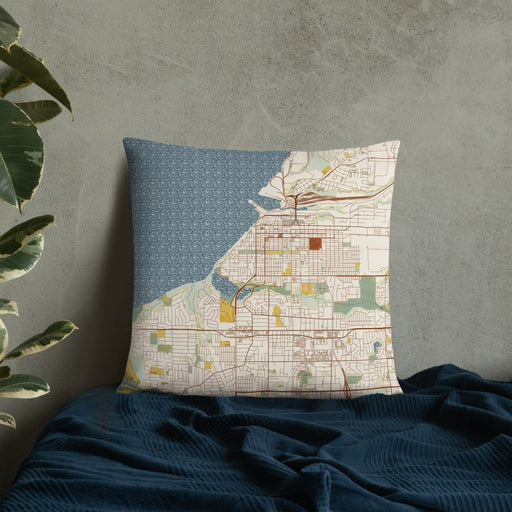 Custom Anchorage Alaska Map Throw Pillow in Woodblock on Bedding Against Wall