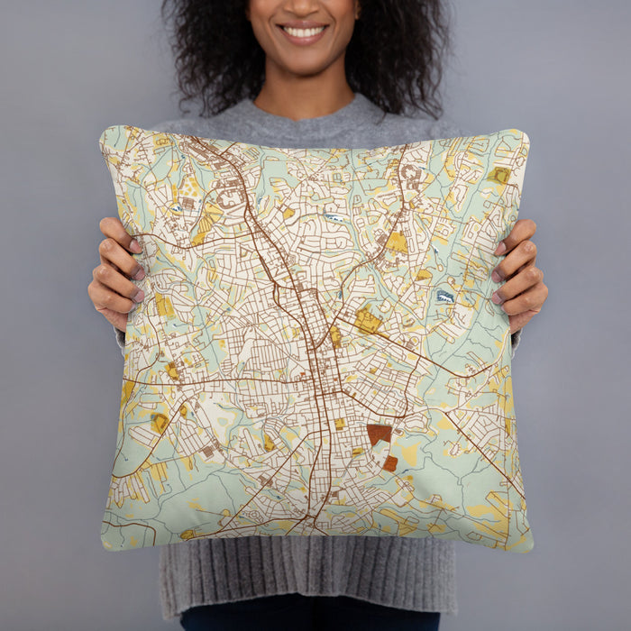 Person holding 18x18 Custom Anderson South Carolina Map Throw Pillow in Woodblock
