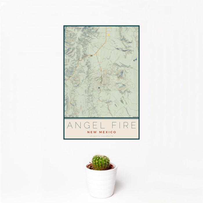 12x18 Angel Fire New Mexico Map Print Portrait Orientation in Woodblock Style With Small Cactus Plant in White Planter
