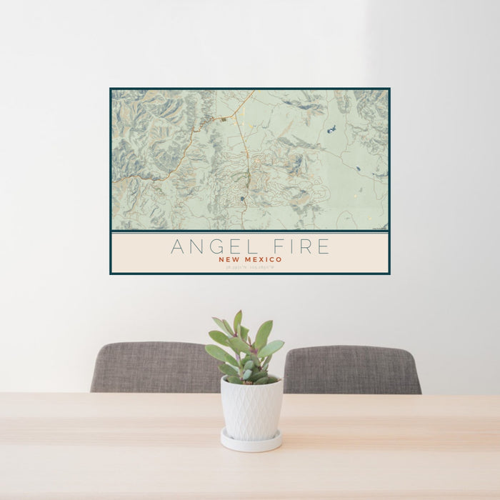 24x36 Angel Fire New Mexico Map Print Landscape Orientation in Woodblock Style Behind 2 Chairs Table and Potted Plant