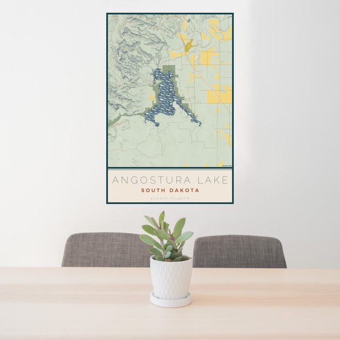 24x36 Angostura Lake South Dakota Map Print Portrait Orientation in Woodblock Style Behind 2 Chairs Table and Potted Plant