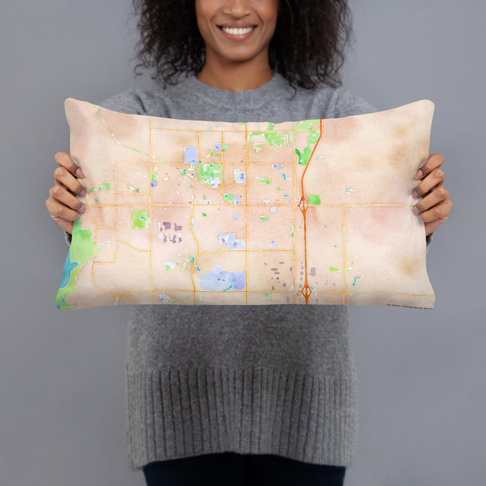 Person holding 20x12 Custom Ankeny Iowa Map Throw Pillow in Watercolor