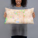 Person holding 20x12 Custom Ankeny Iowa Map Throw Pillow in Watercolor