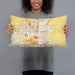 Person holding 20x12 Custom Ankeny Iowa Map Throw Pillow in Woodblock