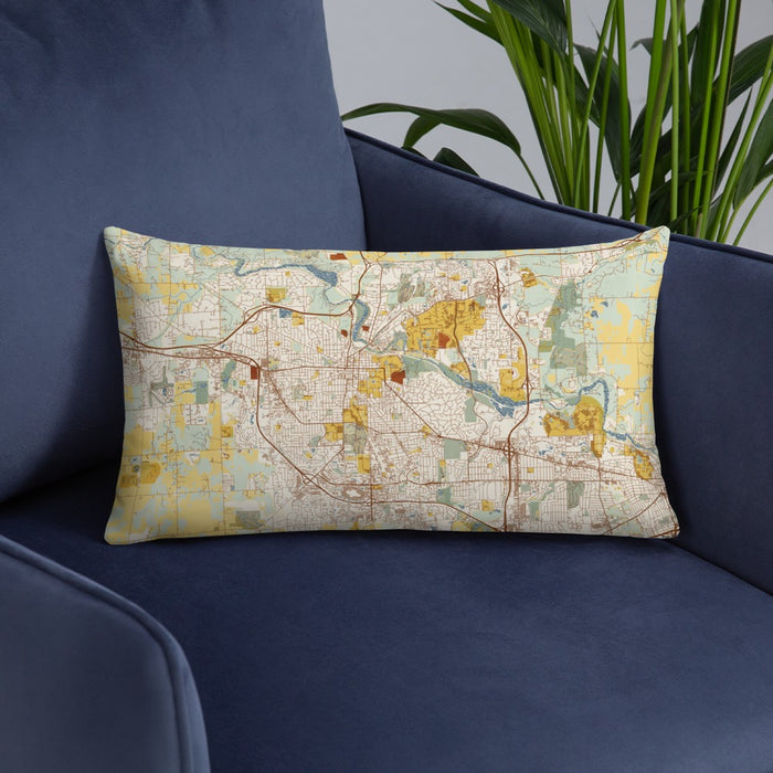 Custom Ann Arbor Michigan Map Throw Pillow in Woodblock on Blue Colored Chair