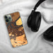 Custom Antioch California Map Phone Case in Ember on Table with Black Headphones
