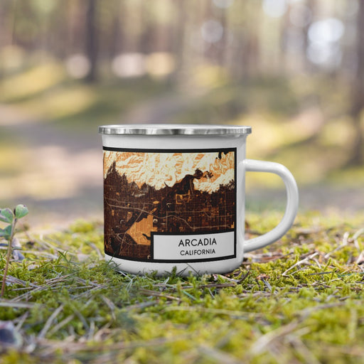 Right View Custom Arcadia California Map Enamel Mug in Ember on Grass With Trees in Background