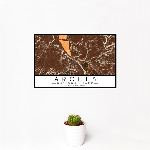 12x18 Arches National Park Map Print Landscape Orientation in Ember Style With Small Cactus Plant in White Planter