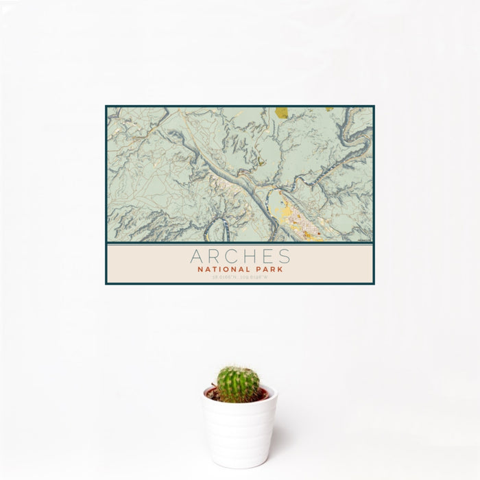 12x18 Arches National Park Map Print Landscape Orientation in Woodblock Style With Small Cactus Plant in White Planter