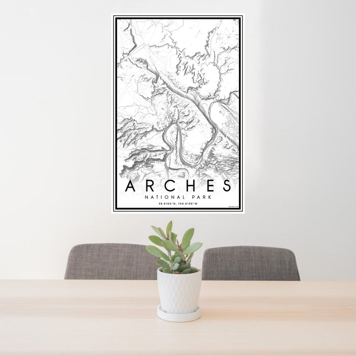 24x36 Arches National Park Map Print Portrait Orientation in Classic Style Behind 2 Chairs Table and Potted Plant