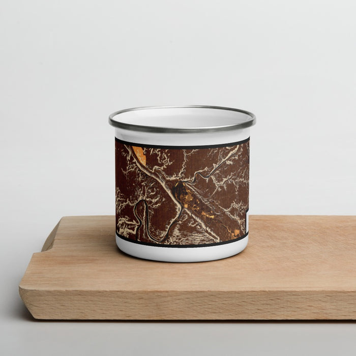 Front View Custom Arches National Park Map Enamel Mug in Ember on Cutting Board