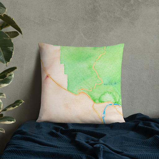 Custom Arches National Park Map Throw Pillow in Watercolor on Bedding Against Wall