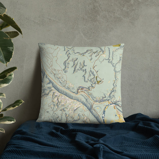 Custom Arches National Park Map Throw Pillow in Woodblock on Bedding Against Wall
