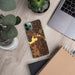 Custom Arlington Washington Map Phone Case in Ember on Table with Laptop and Plant