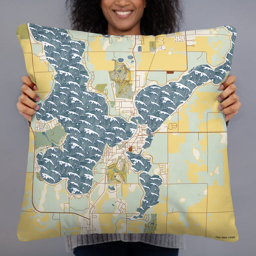 Person holding 22x22 Custom Arnolds Park Iowa Map Throw Pillow in Woodblock