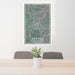 24x36 Asheville North Carolina Map Print Portrait Orientation in Afternoon Style Behind 2 Chairs Table and Potted Plant