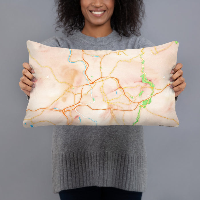 Person holding 20x12 Custom Asheville North Carolina Map Throw Pillow in Watercolor